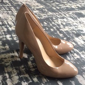 Nude patent heels